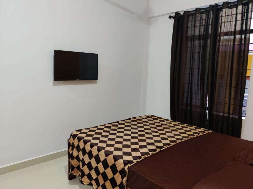 Deluxe Non AC, Prakash Holiday Inn (ex. Rishi House) 