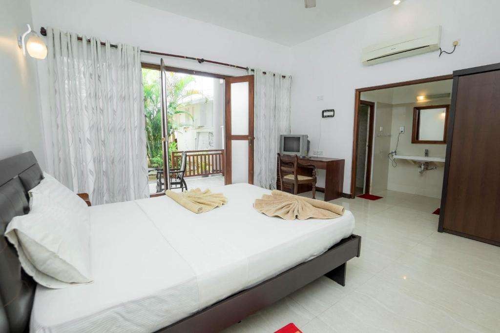 Deluxe Room, Neptune Bay Unawatuna 3*