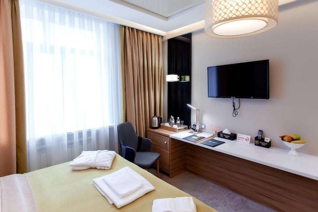 Милдом Сюит, Mildom Premium Hotel 3*