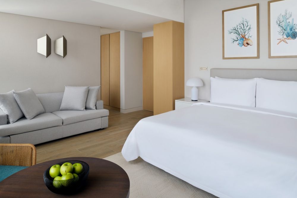 Beachfront Junior Suite, Movenpick Resort Al Marjan Island 5*